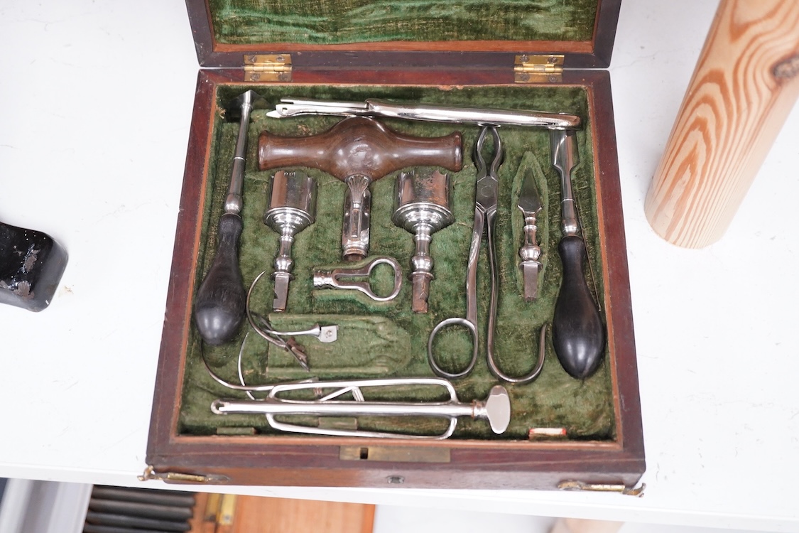 A mahogany cased Georgian medical trepanning set by William Haseldine Pepys FGS FRS (1775-1856), comprising steel drill bits, tool holders, forceps, etc. the forceps stamped W. Pepys, dimensions of the case; 20cm wide, 5